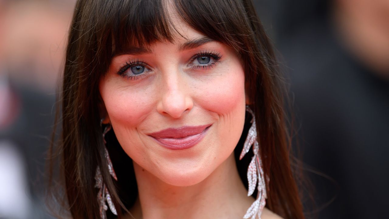 Dakota Johnson’s ‘Glossed Chestnut’ Hair Is the Brunette Color of the Summer