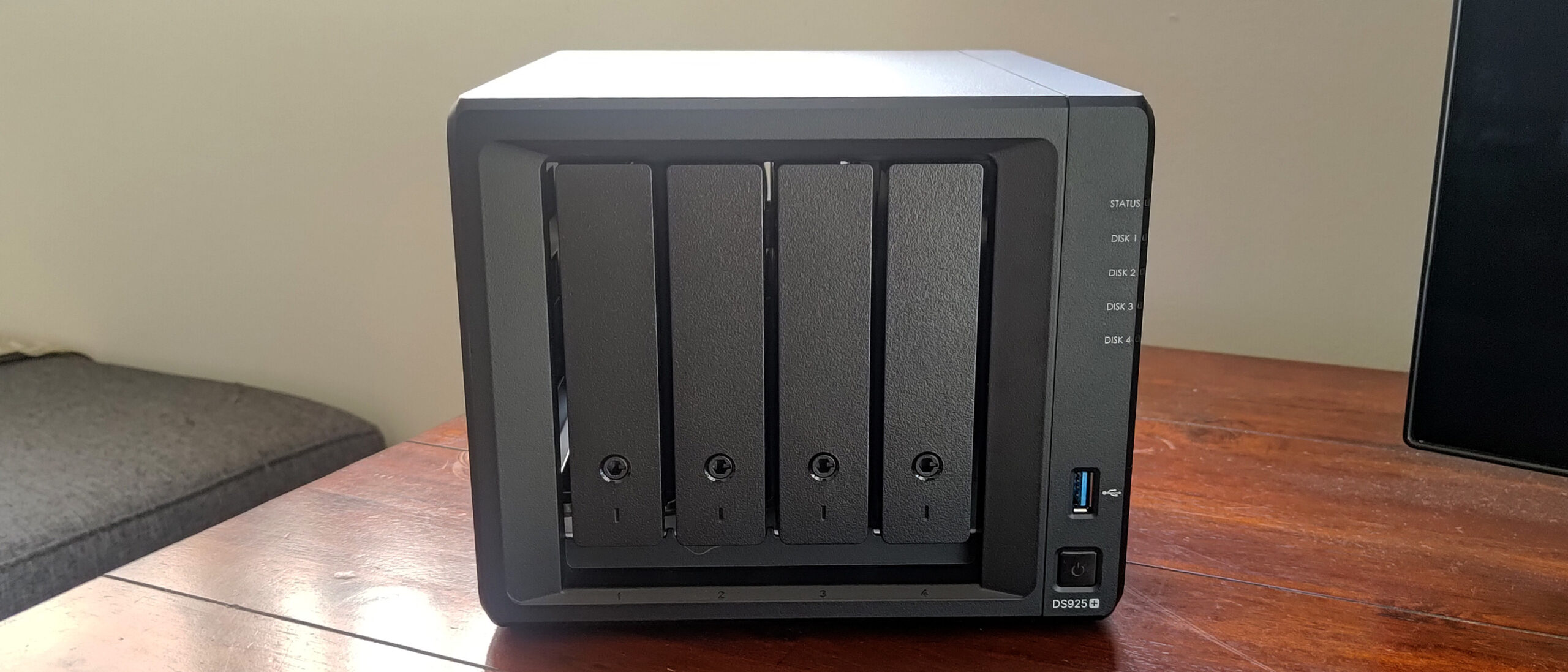 Synology DiskStation DS925+ on a table wide image
