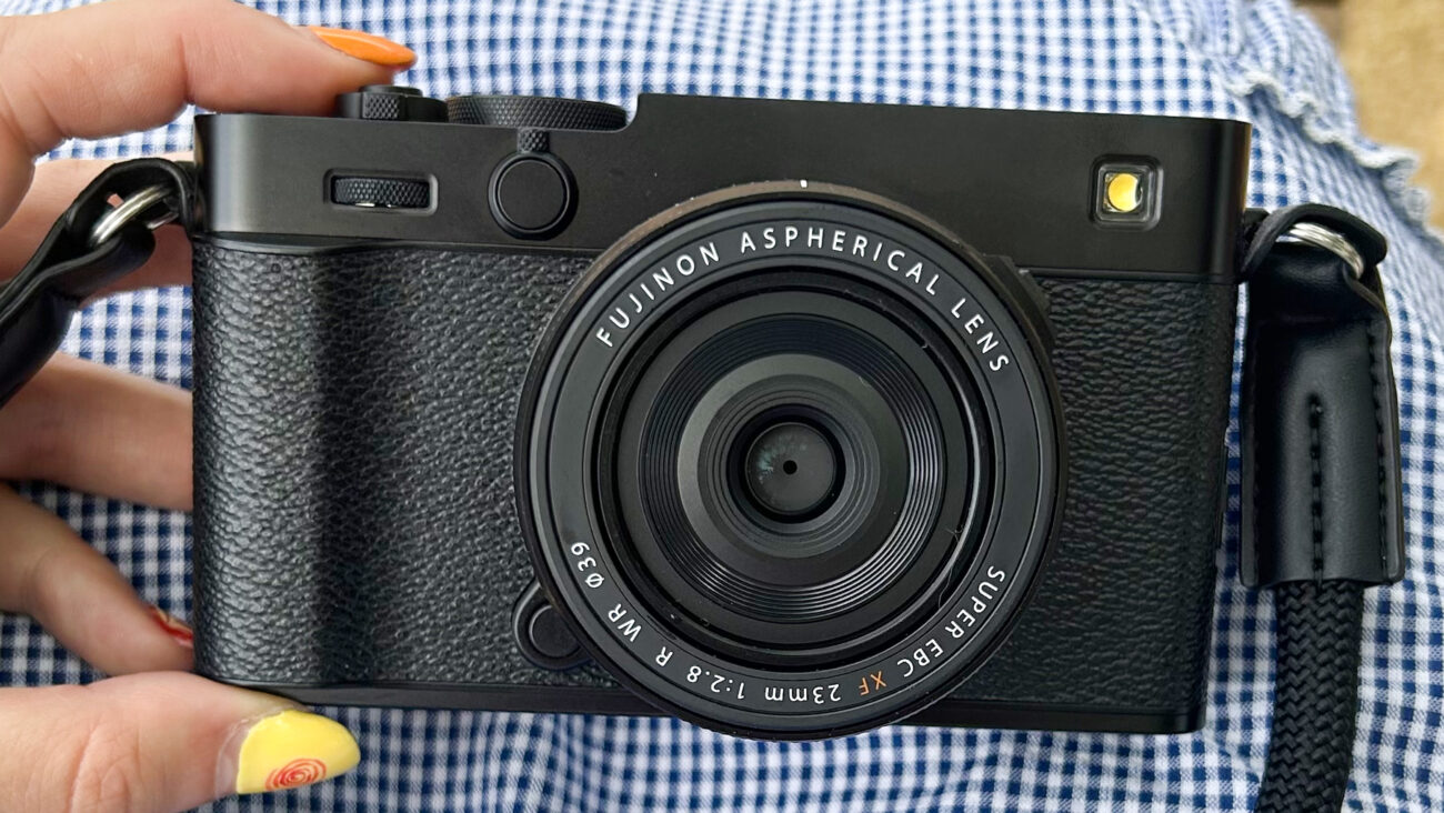 Hand holding the new Fujifilm X-E5 film simulation camera.