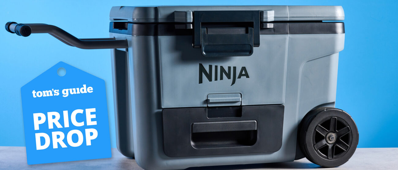 The Ninja FrostVault Cooler pictured in front of a blue background with a price drop tag