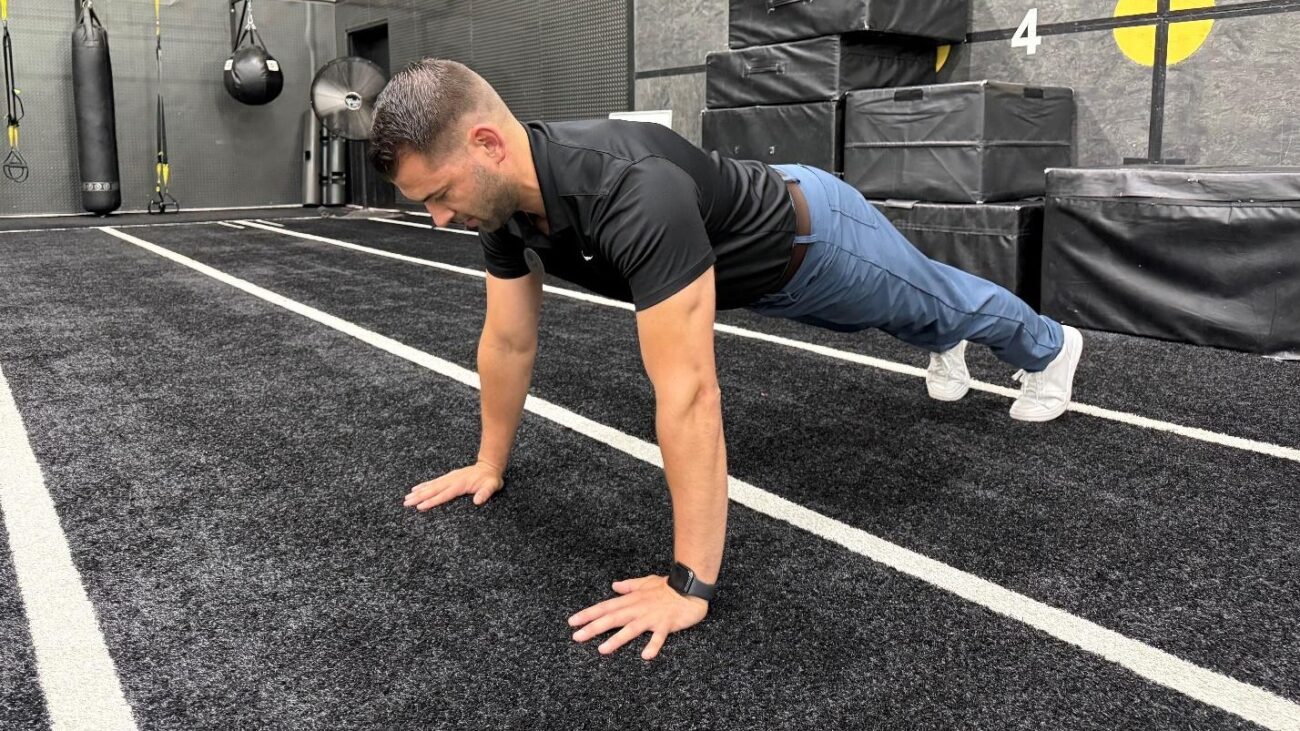 man doing exercise in the gym