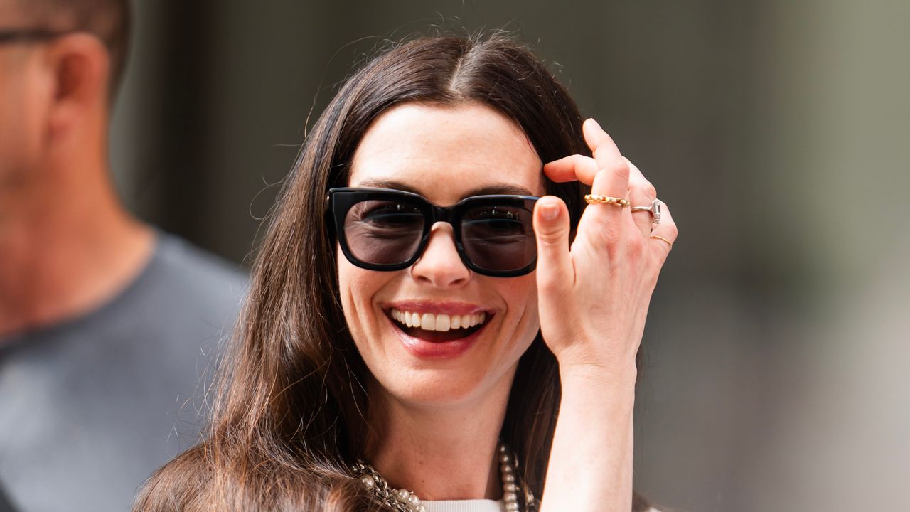 Anne Hathaway's Coach Messenger Bag Is the Hardest Working Cast-Member of The Devil Wears Prada 2