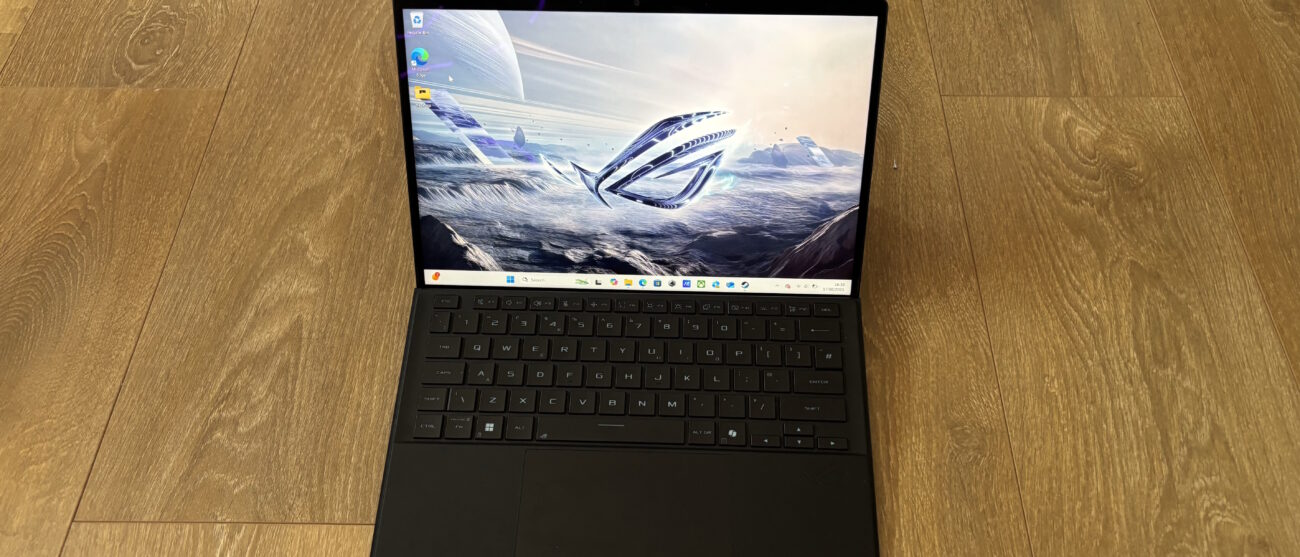 Asus ROG Flow Z13 gaming tablet on wooden surface