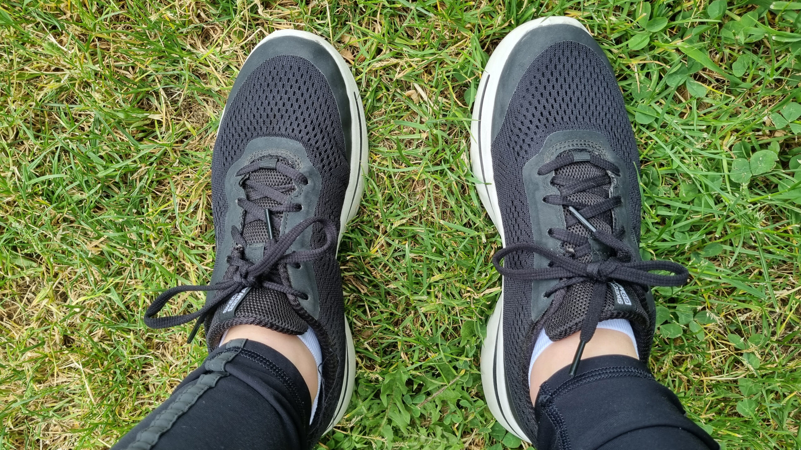 Skechers Go walk Arch Fit Motion Breeze on person's feet