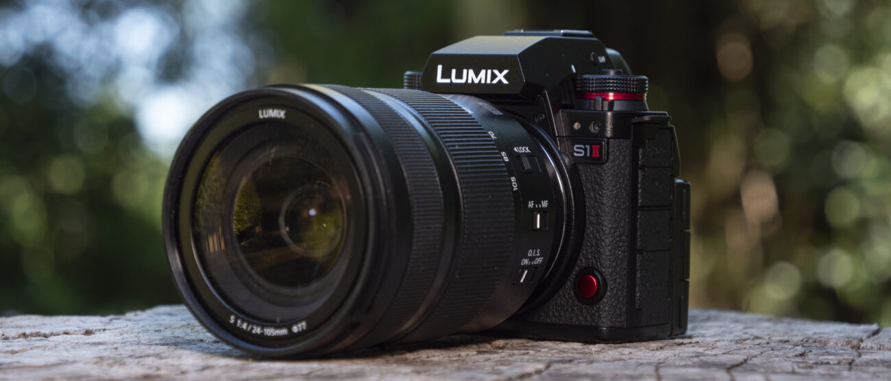 Panasonic Lumix S1 II mirrorless camera outdoors on a wooden surface