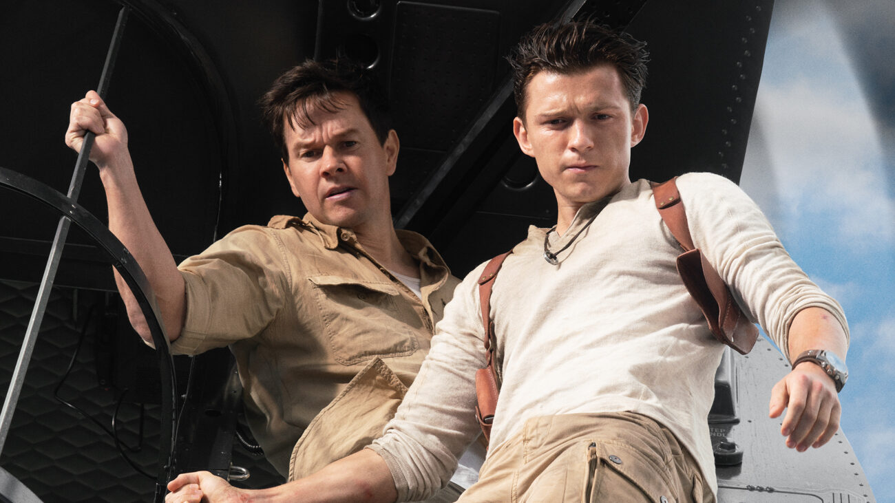 Mark Wahlberg stars as Victor &ldquo;Sully&rdquo; Sullivan and Tom Holland is Nathan Drake &mdash; both seen staring out of a helicopter &mdash;in Columbia Pictures' UNCHARTED