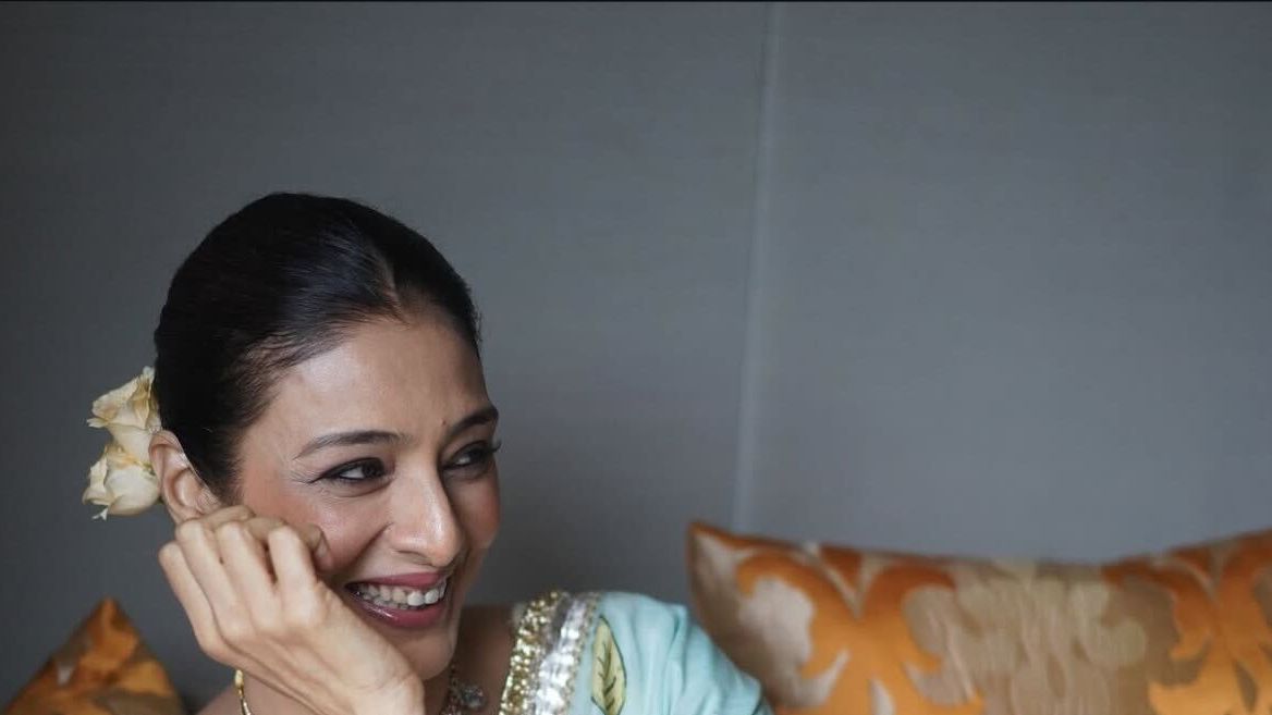Tabu's ivory lehenga comes alive with a floral and avian motif dupatta