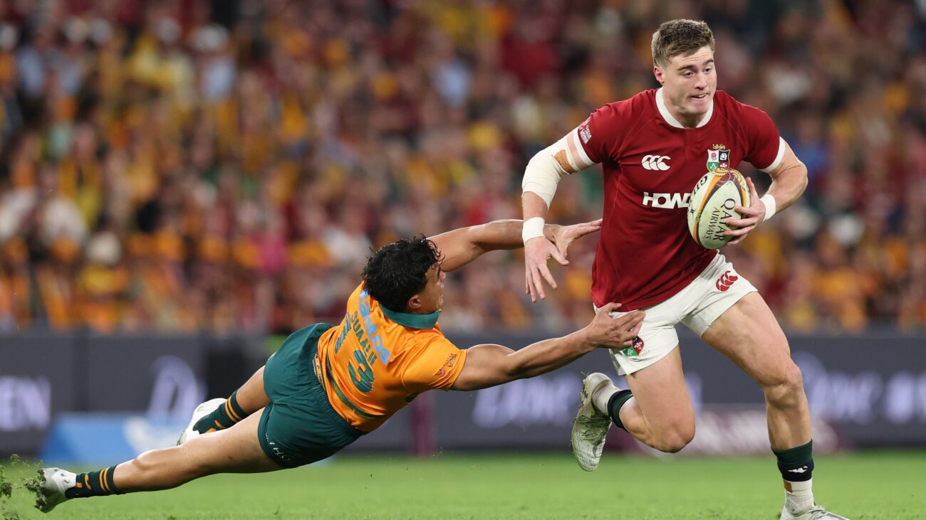 Tommy Freeman of British and Irish Lions gets past Joseph-Aukuso Suaalii of Australia during the 1st Test Match between Australia Wallabies and British &amp; Irish Lions