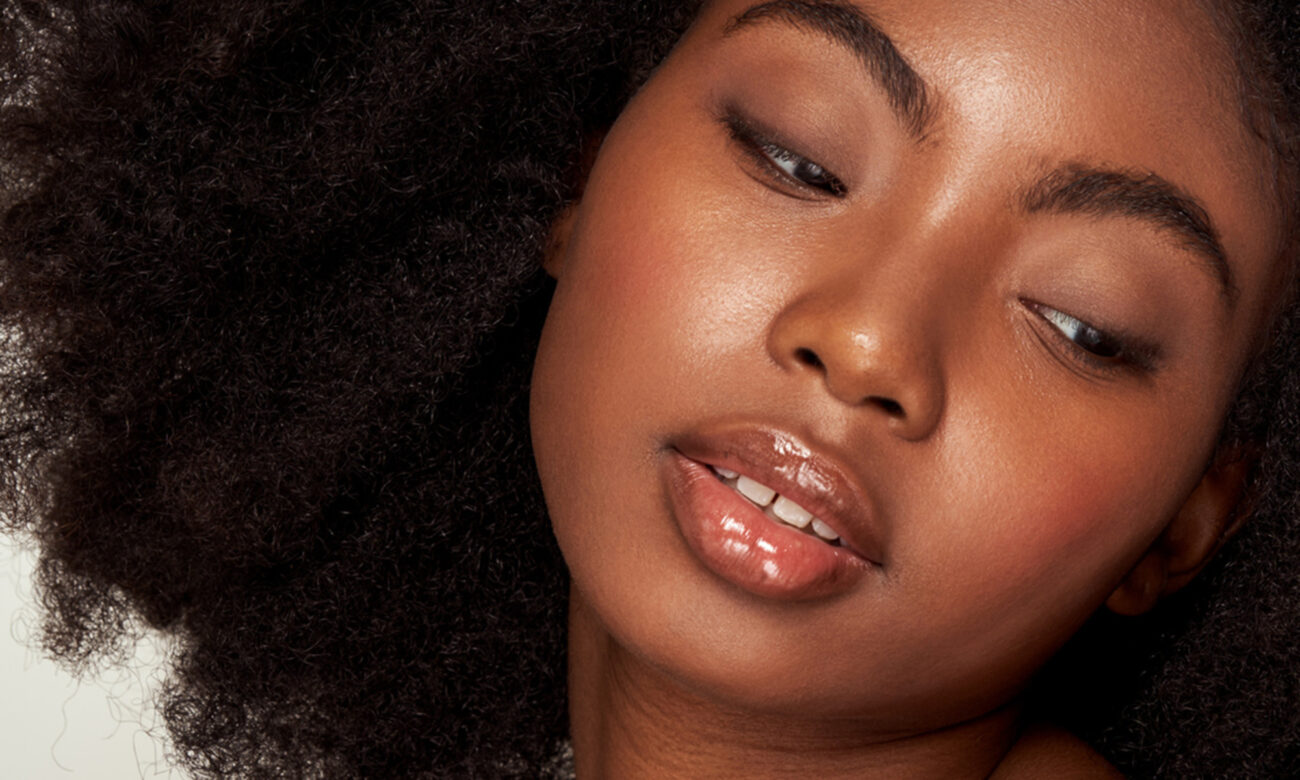 A Makeup Artist's Hack To Tone Down Shine & Still Look Dewy