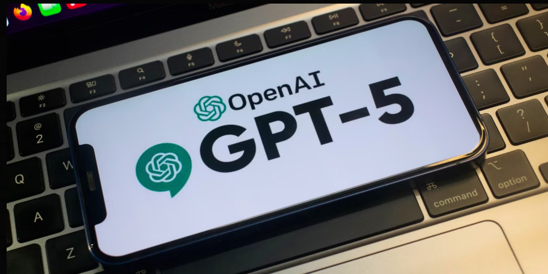 Image of a phone with chatgpt logo on a keyboard