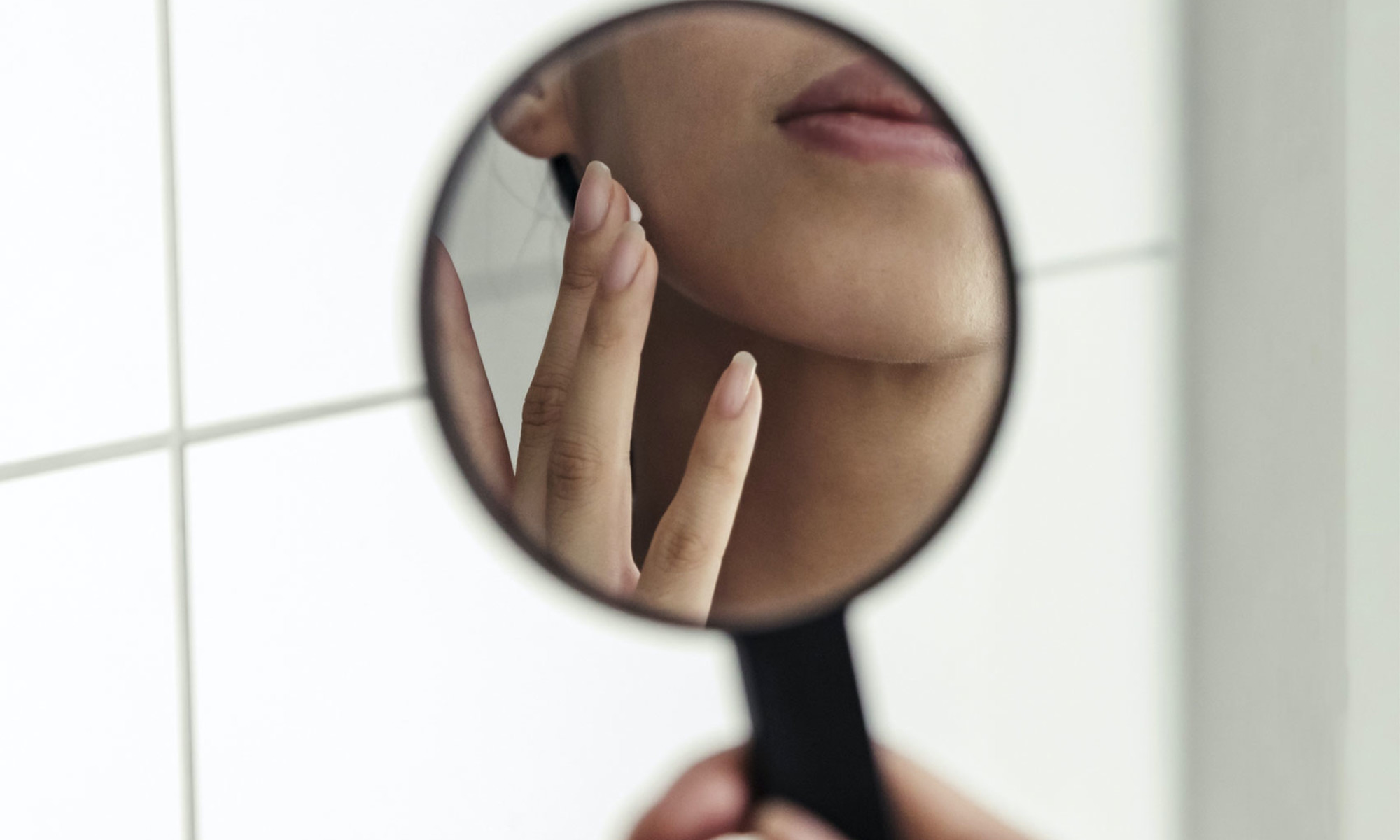 Does Biotin Cause Breakouts? Derms Respond To The Common Concern