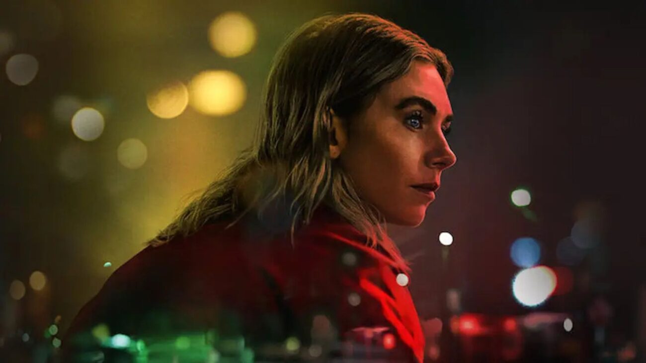 Vanessa Kirby stares off into nothing surrounded by bright lights