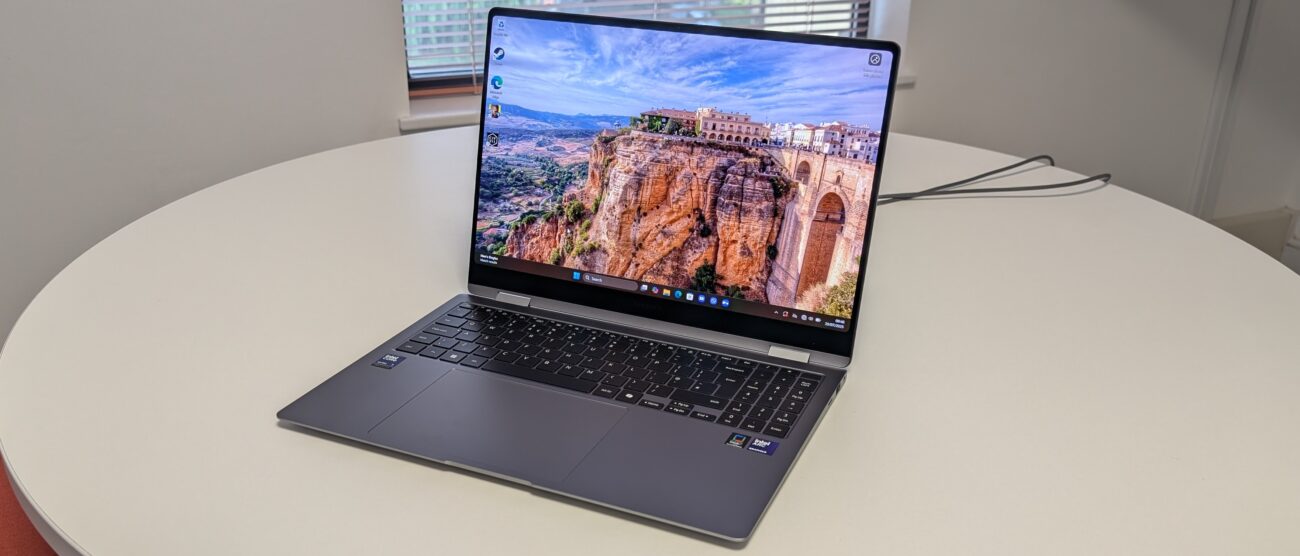 The Samsung Galaxy Book5 Pro 360 photographed on a white desk.