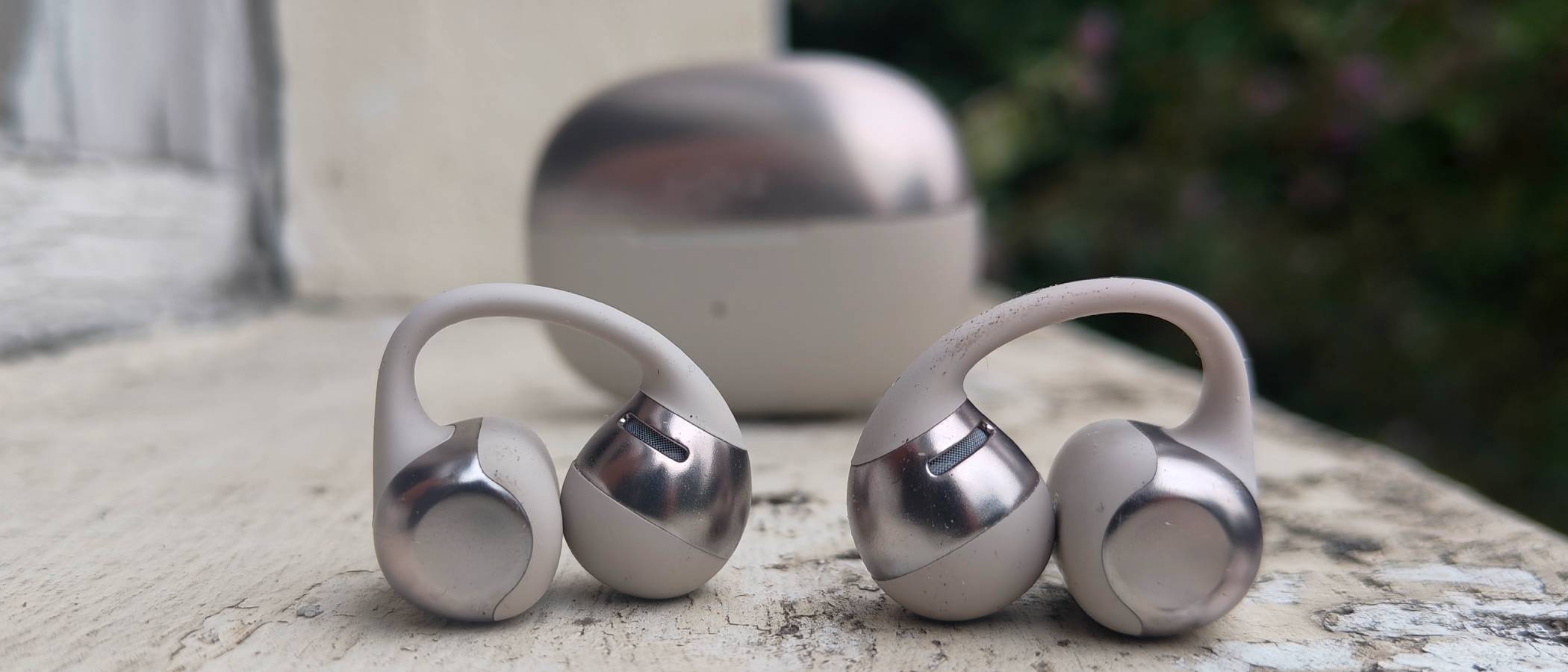 The Shokz OpenDots One on a white windowsill