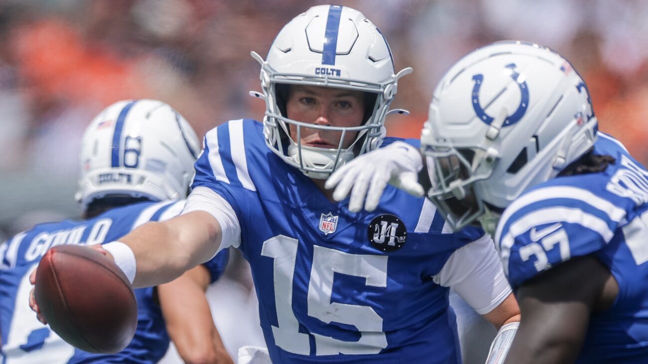 CINCINNATI, OHIO - AUGUST 23: Riley Leonard #15 of the Indianapolis Colts hands off to Ulysses Bentley IV #37 of the Indianapolis Colts during the NFL Preseason 2025 game between Indianapolis Colts and Cincinnati Bengals at Paycor Stadium on August 23, 2025 in Cincinnati, Ohio. (Photo by Michael Hickey/Getty Images)