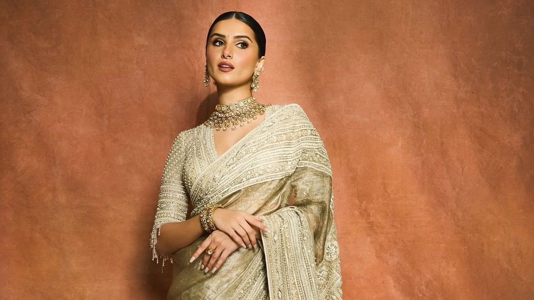 Tara Sutaria’s champagne Kanjeevaram sari gleams with zardozi and pearls